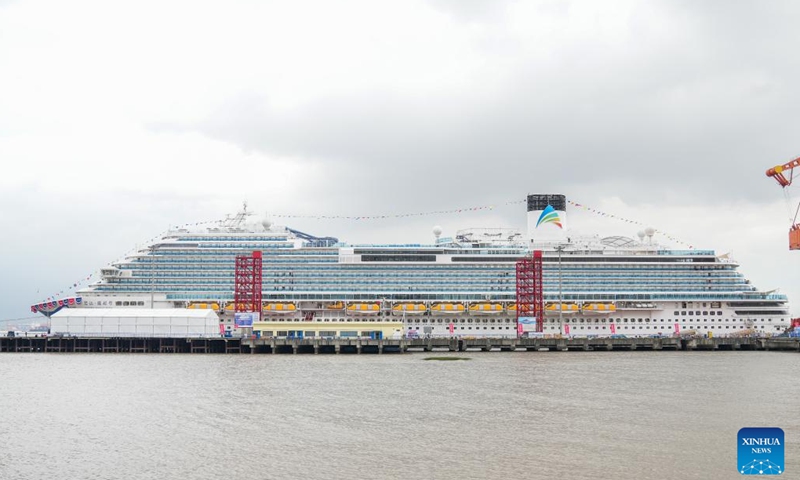 This photo taken on Nov. 4, 2023 shows the exterior view of cruise ship Adora Magic City in Shanghai, east China. After five years of design, building and a subsequent trial voyage, China's first domestically-built large cruise ship, the Adora Magic City, was delivered in Shanghai on Saturday, with its maiden voyage scheduled for Jan. 1, 2024. (Photo: Xinhua)