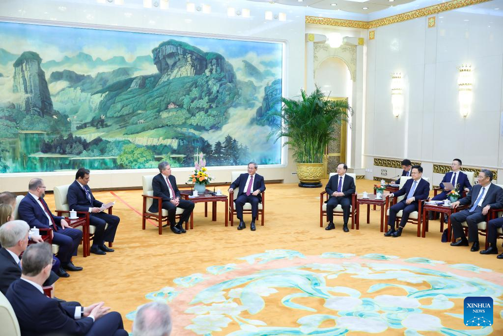 Chinese Premier Li Qiang meets with U.S. Senator Steve Daines and some American business people, who are here to attend the China Development Forum 2025 in Beijing, capital of China, March 23, 2025. Photo: Xinhua