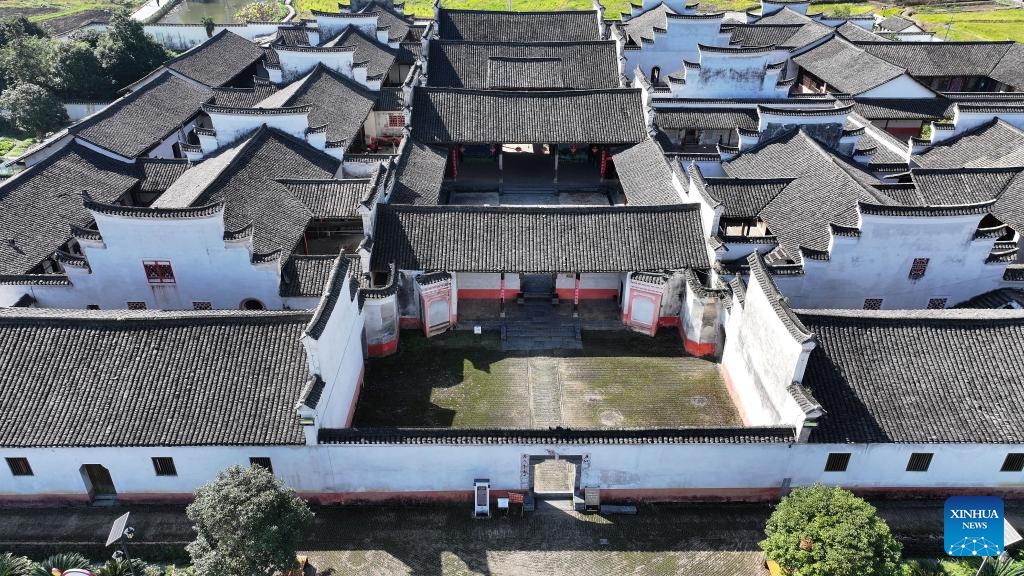 An aerial drone photo taken on Nov. 8, 2024 shows part of the Zhou Family Courtyard in Lingling District of Yongzhou City, central China's Hunan Province. Boasting a history of hundreds of years, the Zhou Family Courtyard and the Hu Family Courtyard, with their houses crisscrossing in a tightly structured and meticulously arranged layout, showcase a long history and rich cultural heritage of traditional Chinese villages. (Photo: Xinhua)