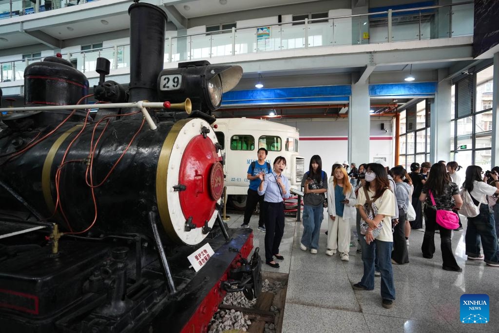 People visit Yunnan Railway Museum in Kunming, southwest China's Yunnan Province, May 16, 2025. Housed in Kunming North Railway Station, the Yunnan Railway Museum takes the century-long development history of Yunnan railway as the leading story line to narrate the frog-leaping evolution railway gauge standards from meter gauge to inch gauge, and standard gauge, as well as railway technologies from steam locomotives to high-speed rails. (Photo: Xinhua)